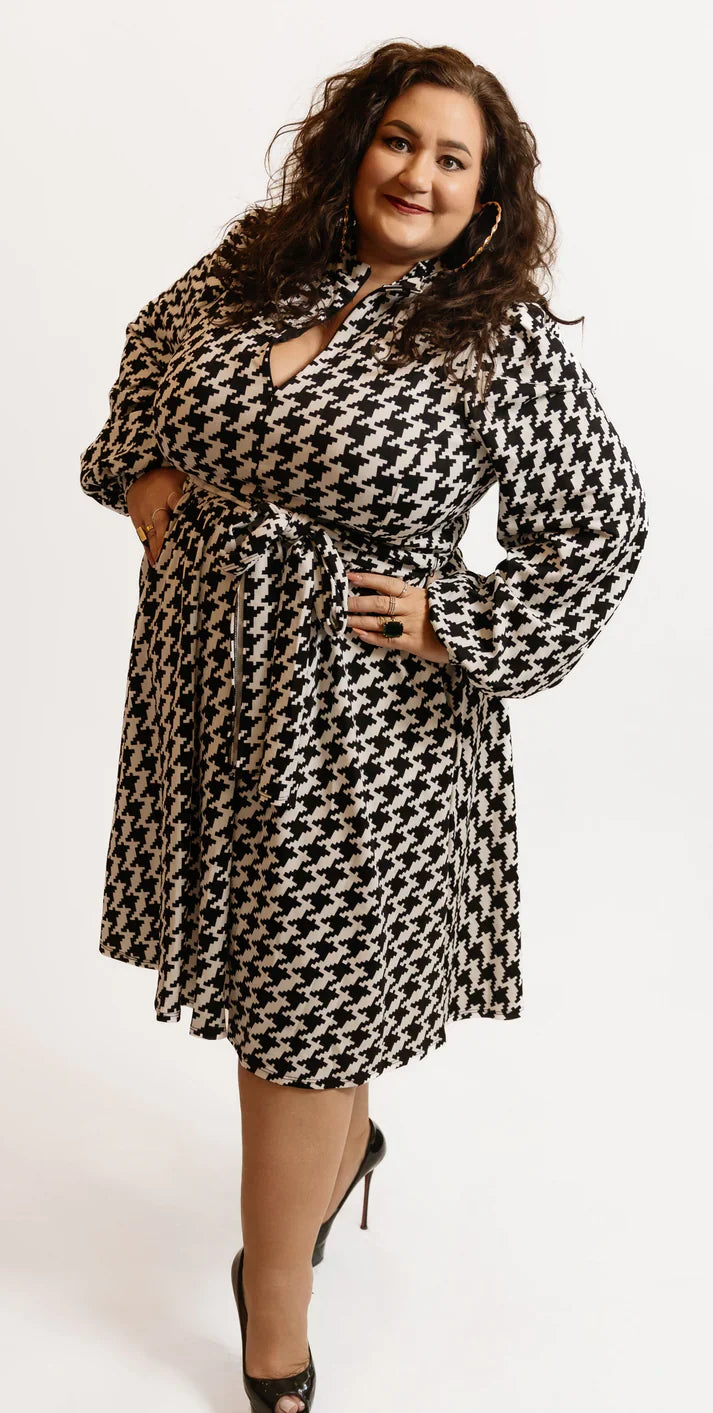 Plus size black floral maxi dress with long sleeves and smocked waist at Harlow + James boutique in West Des Moines Iowa, sizes 1X-4X