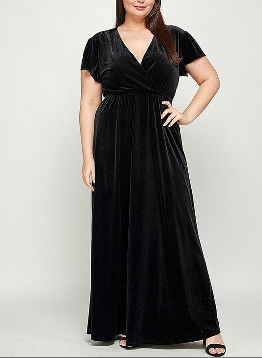 Woman wearing a black evening gown on a white background